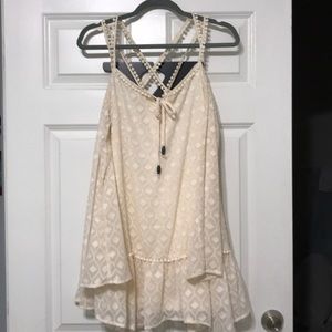 Strappy cream off the shoulder top